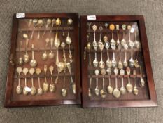 A pair of glazed wall-hanging display cabinets,