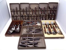 Approximately eleven stainless steel cutlery sets by Denby