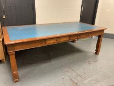 An early 20th century mahogany library table fitted with drawers.