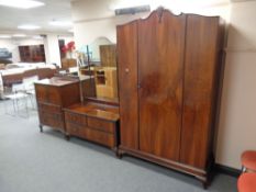 A late Edwardian stained walnut three piece bedroom suite : single door wardrobe,