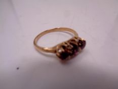 A 9ct gold amethyst and diamond ring