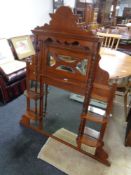 A late Victorian mahogany sideboard mirror back