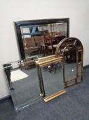 A contemporary over mantel mirror in marble effect frame,