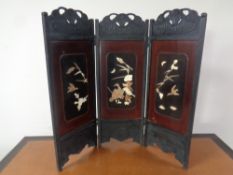 A Japanese shibayma lacquered three-fold screen,