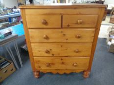 A 19th century pine five drawer chest