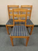 Three pine ladder back chairs