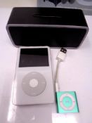 An Apple Ipod 60 gb, Blu tooth speaker,