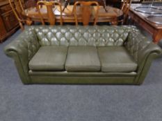 A Chesterfield three seater faux leather settee