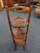 An Edwardian mahogany cake stand