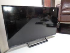A Panasonic TX-32 ES 503B LCD TV with remote