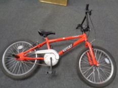 A Trax BMX bike with stunt pegs