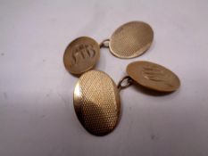 A pair of 9ct gold cufflinks, 5.9g.
