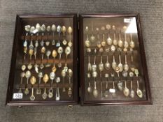 A pair of glazed wall-hanging display cabinets,