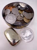 A tin containing English and foreign coins, pre decimal coins, £2 and £5 coins,