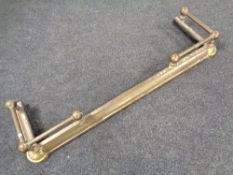 A 19th century brass fire fender