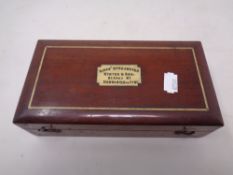 A Sike's hydrometer in a mahogany case