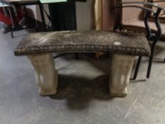 A shaped concrete garden bench