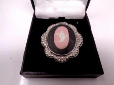 A hallmarked Chester 1948 silver and pink Wedgwood Jasper ware brooch (converts to a pendant) with