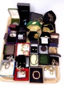 A tray of costume jewellery, bracelets, necklaces, earrings, brooches, heart pendant,