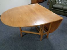 A Nathan teak drop leaf table,