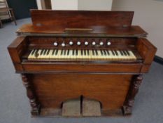 A 19th century rosewood cased harmonium by C Lanland of London
