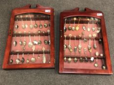 A pair of glazed wall-hanging display cabinets,