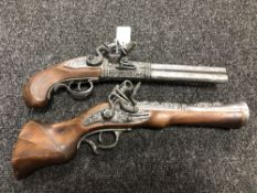 Two fantasy pistols