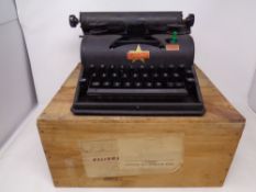 A Lilliput typewriter in original pine box