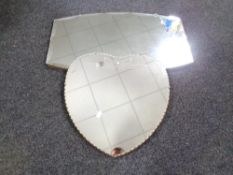 A frameless heart shaped mirror together with a similar mirror and a further Oriental lacquered