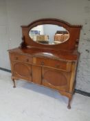An Edwardian mahogany mirror back sideboard