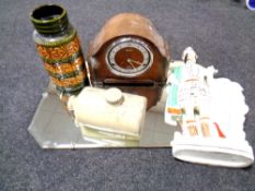 A frameless mirror together with a West German vase, mantel clock, Staffordshire figure,