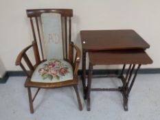 A beech framed armchair together with a nest of two tables