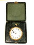 A vintage travel clock in green leather case CONDITION REPORT: Currently does not