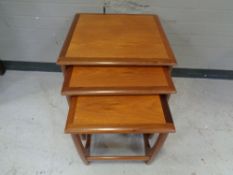 A 20th century G Plan nest of three teak tables