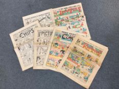 Six World War One era comics to include Charlie Chaplin dated 1915,