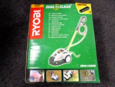 A boxed Ryobi pressure washer
