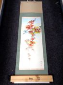 A Japanese scroll depicting a finch perched on a branch