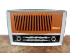 A Ferranti radio together with two gilt framed mirrors