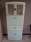 A mid 20th century kitchen cabinet
