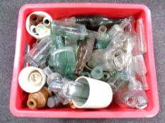 A box of antique and later glass bottles