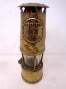 An Eccles Protector brass miner's lamp
