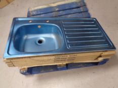 Five stainless steel sink inserts