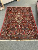 A Hamadan rug 138 cm x 200 cm