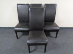 A set of four stitched brown leather high backed dining chairs