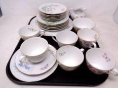 A 21 piece West German floral decorated tea service