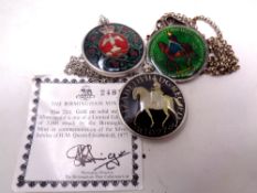 Two Elizabeth II silver jubilee 1977 Crowns, both enamelled and mounted as pendants,