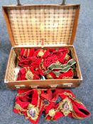 Two vintage leather suitcases containing a quantity of regalia,