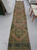 An antique carpet runner,