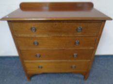 An Edwardian inlaid mahogany four drawer chest
