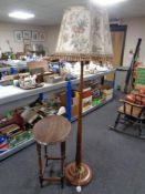 An oak shaped occasional table together with a beech standard lamp